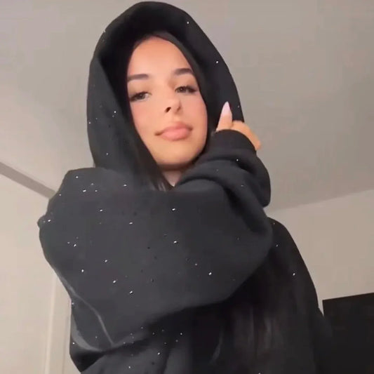 Brillez tout l’hiver avec le sweat à capuche à paillettes Elotrack™